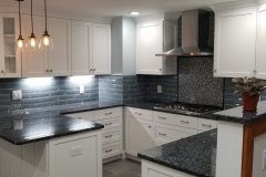 White Cabinets with Beveled Glass Backsplash