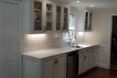 Glazed cabinets with glass upper doors
