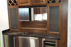 Custom Walnut Bar with Ice Maker , Fridge, and Wine Cooler