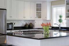 Modern kitchen with White Cabinets and Granite Counterop